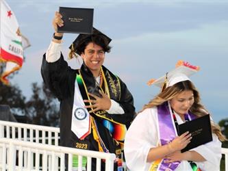 Senior with diploma