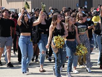 senior walking to rally