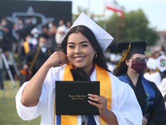 Student holding a diploma