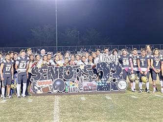 Seniors posing for a picture 